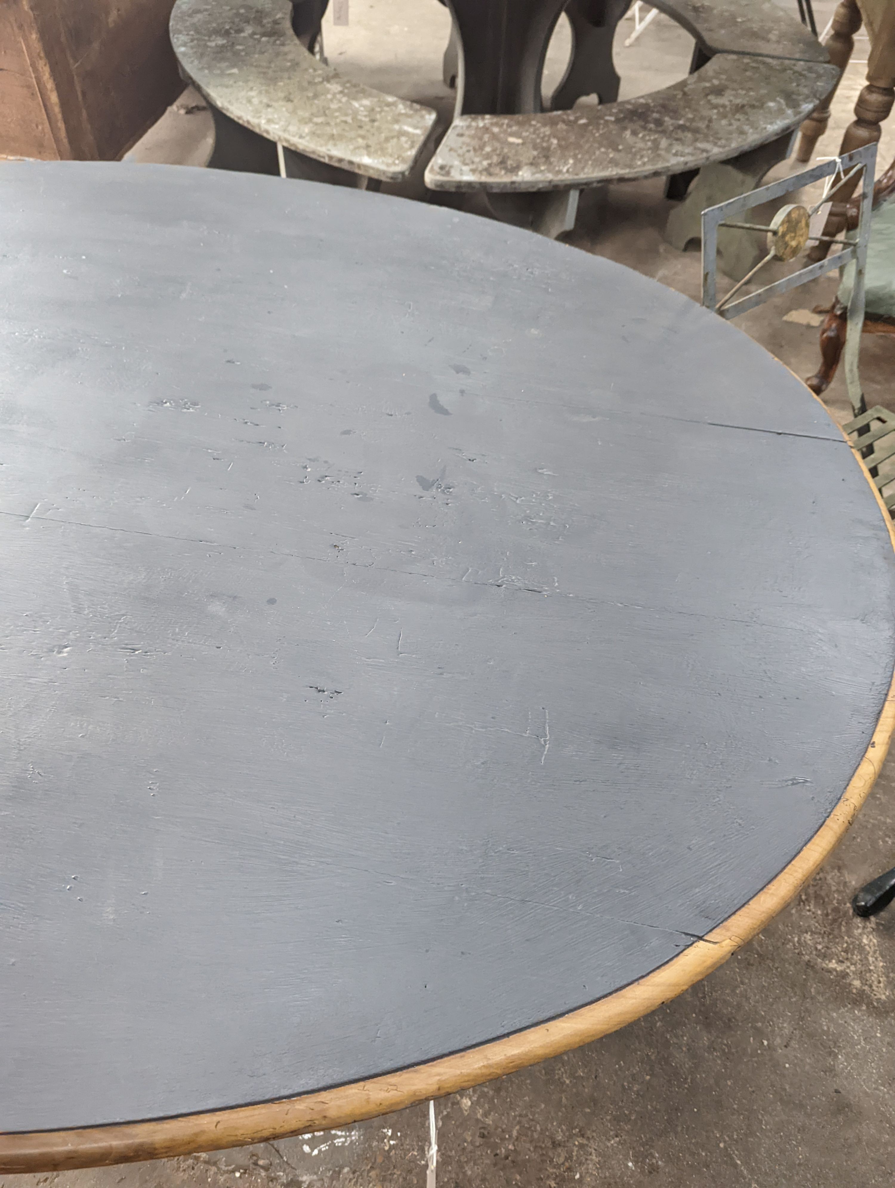 A French oval fruitwood Vendange wine tasting table with later painted top, length 174cm, depth 130cm, height 74cm